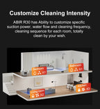 Model of a house with different rooms labeled, featuring text about ABIR R30 cleaning system customization.
